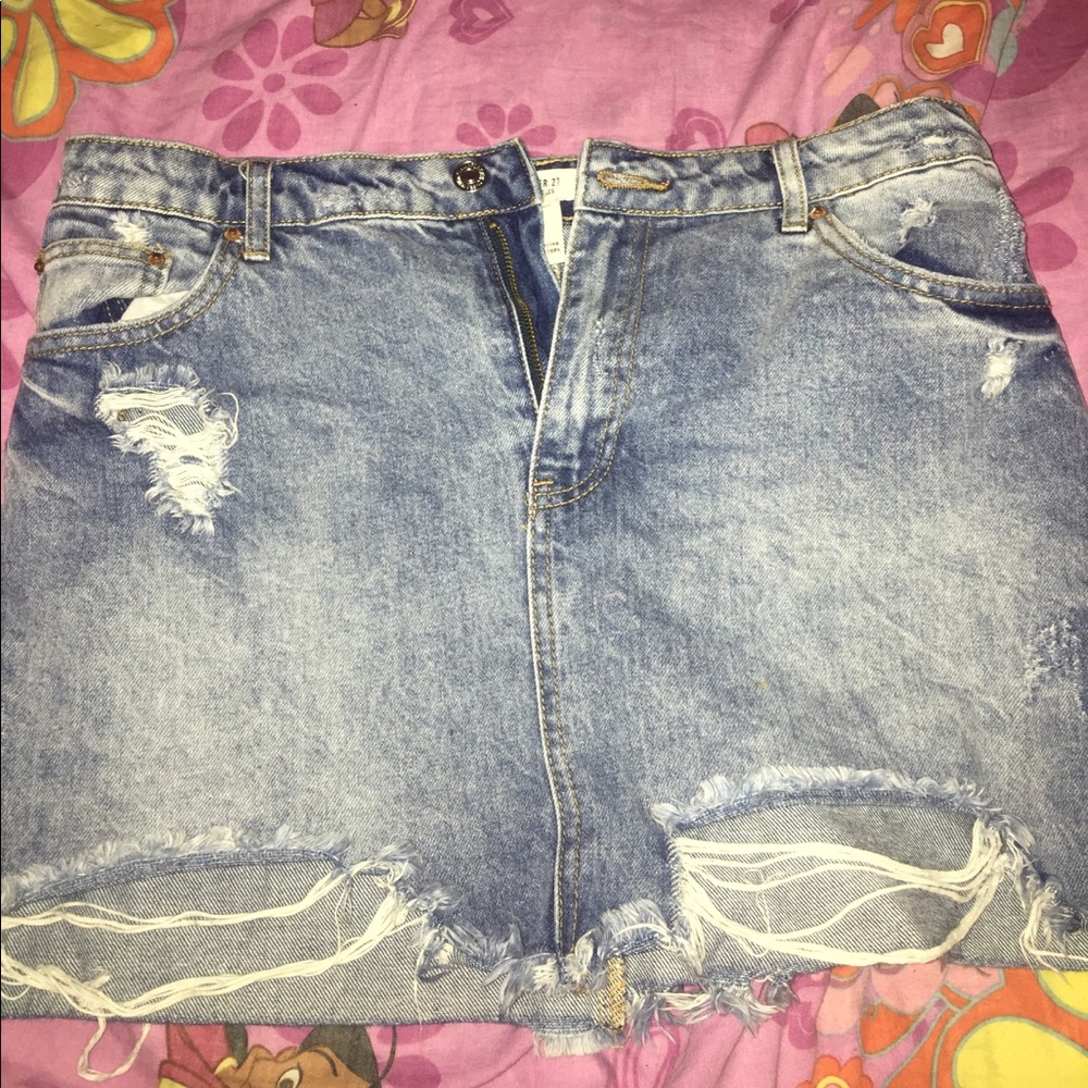Distressed jean skirt